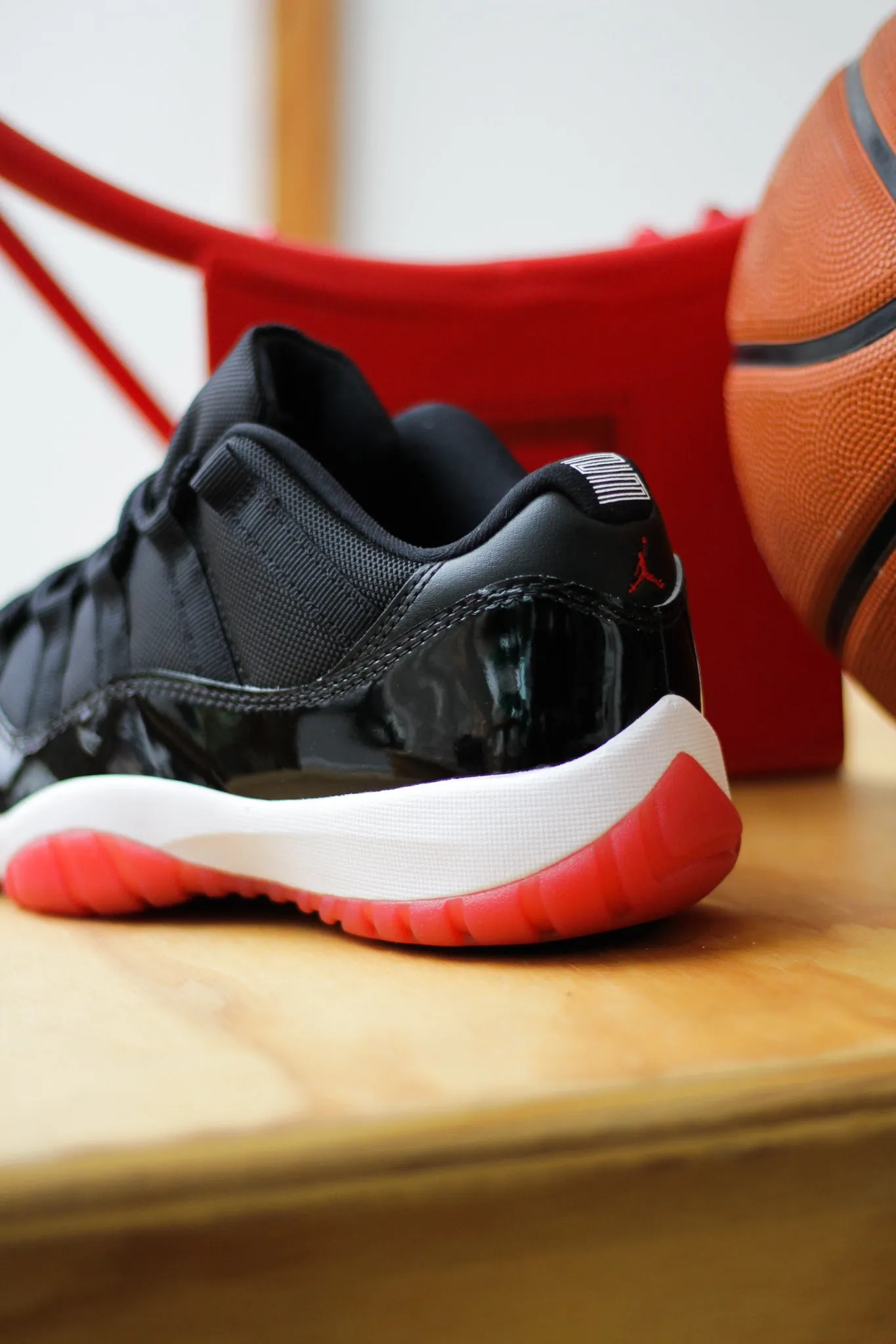 AIR JORDAN 11 RETRO LOW "BLACK/VARSITY RED-WHITE"
